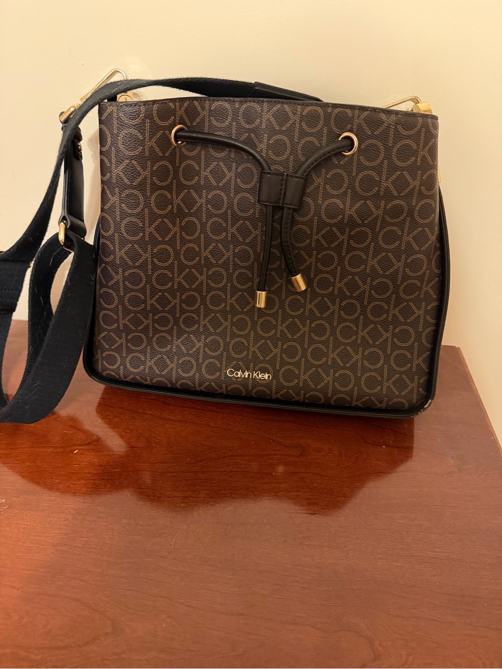 Calvin Klein Brown Monogram Drawstring Crossbody